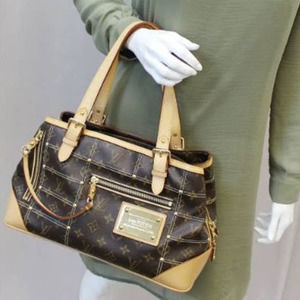 💎✨CHARMING✨💎AUTHENTIC Louis Vuitton Riveting Hand Bag